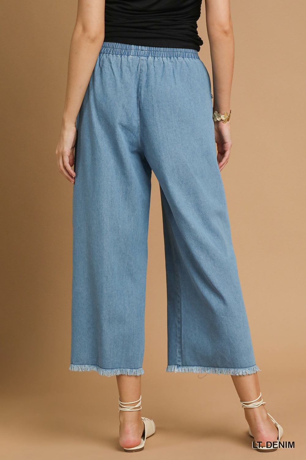 Washed Denim Pants with Fringe Hem