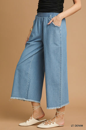 Washed Denim Pants with Fringe Hem